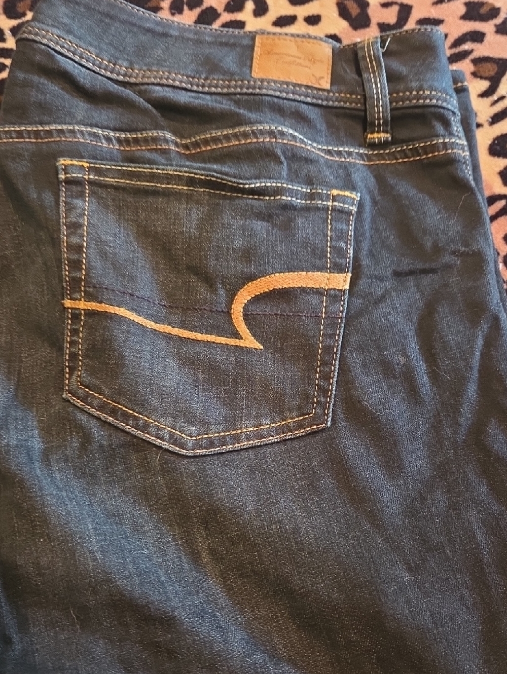 American Eagle Outfitters Dark Blue Skinny Jeans with Tan Stitching